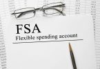 Paper with Flexible Spending Account FSA on a table