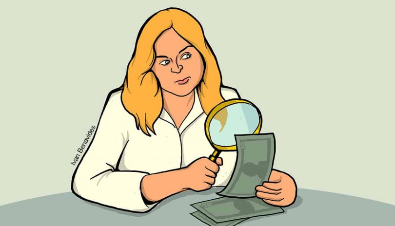 Woman examines whether money is real or fake with a magnifying glass as she learns how to win a sweepstakes contest (illustrated)