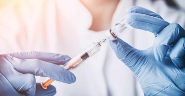 doctor, flu shot. how to prevent getting the flu