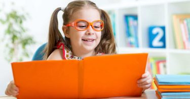 kid reading book