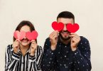 funny couple is happy because they saved money on valentines day