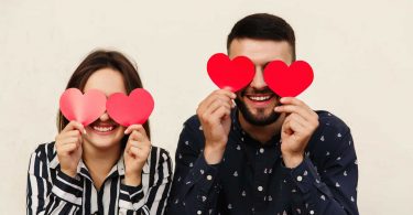 funny couple is happy because they saved money on valentines day