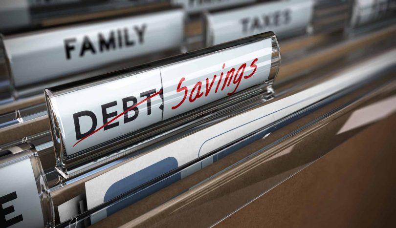 a file folder for debt becomes a folder for saving money after paying it all off