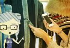 lady doing a qr scan on an item