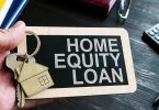 Home Equity Loan sign and key for house