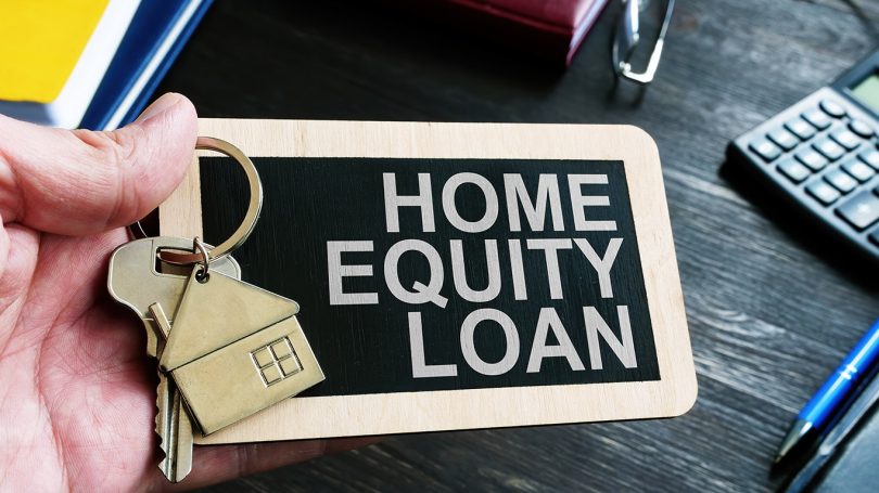 Home Equity Loan sign and key for house