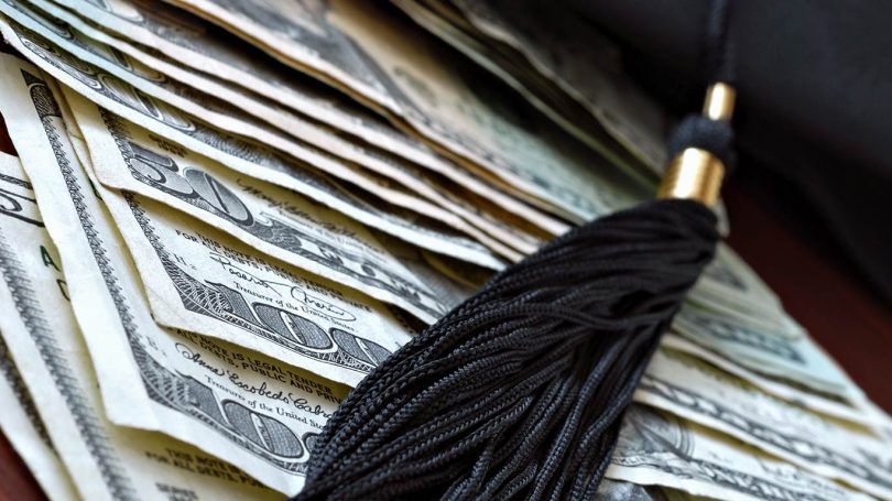Higher education conceptual image with graduation