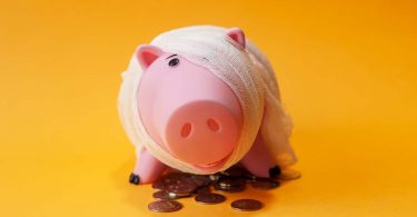 Poor injured piggy bank toy