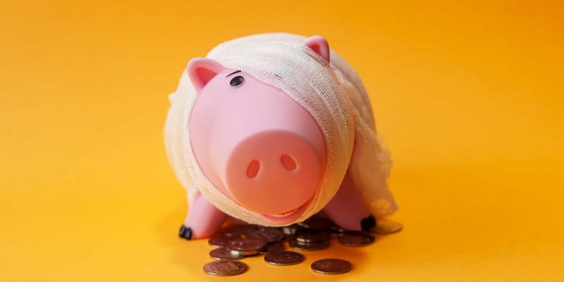 Poor injured piggy bank toy